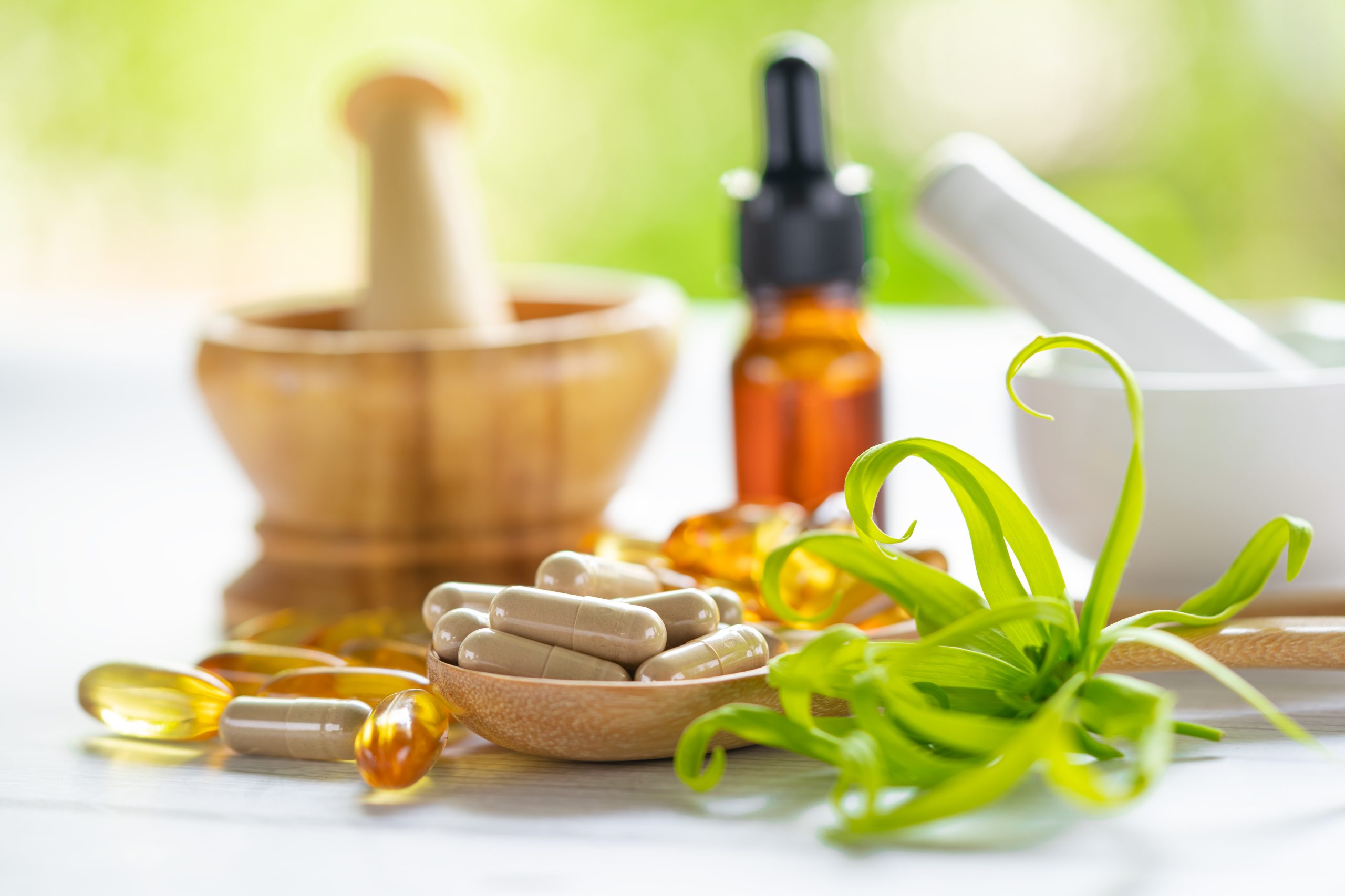 Alternative medicine herbal organic capsule with vitamin E omega 3 fish oil, mineral, drug with herbs leaf natural supplements for healthy good life.